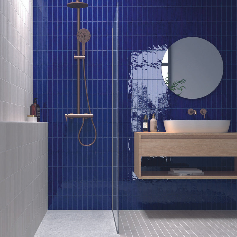 Fango Cobalt Porcelain Tile in a shower