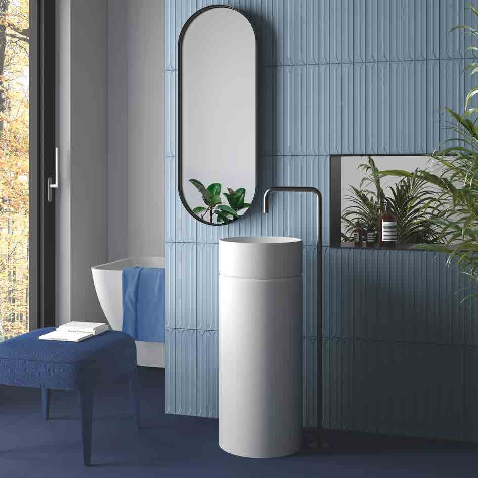 Mingle Blue Ceramic Wall Tile in a bathroom