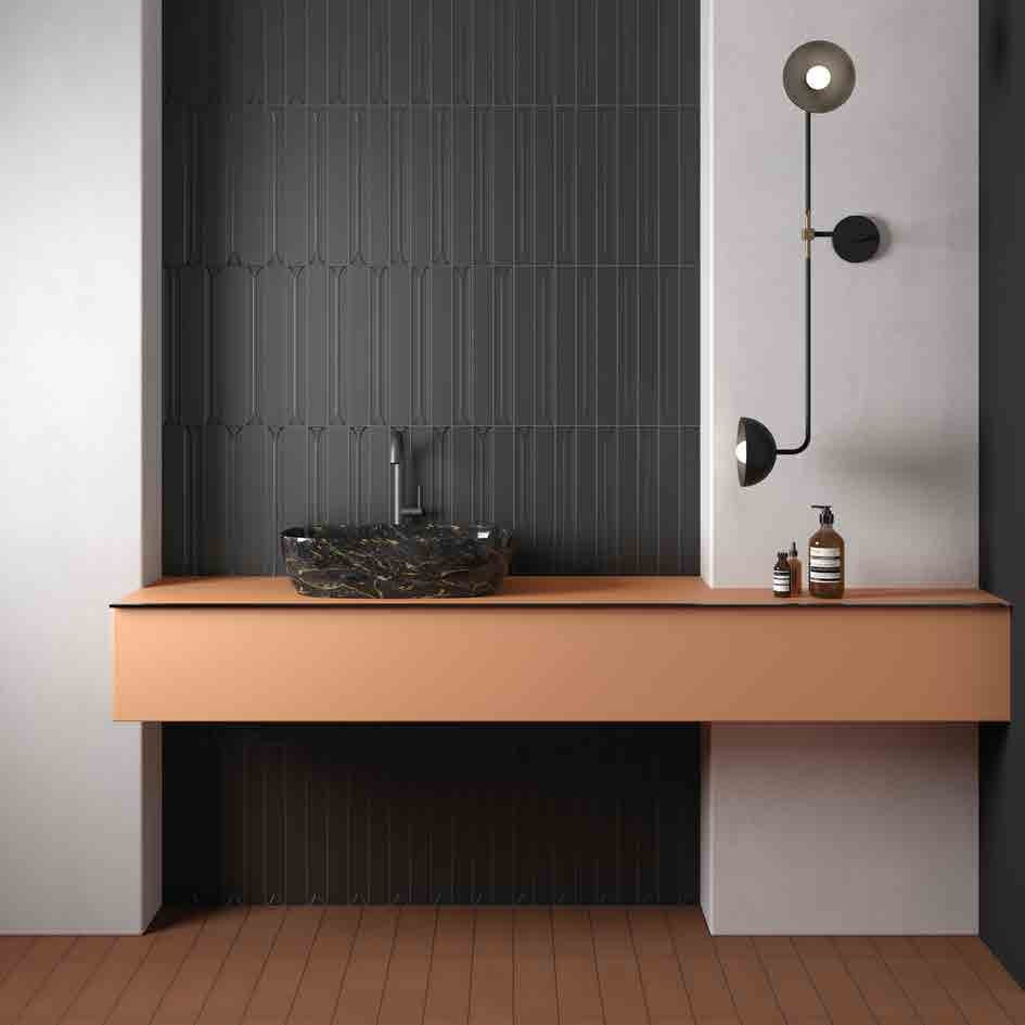 Mingle Graphite Ceramic Wall Tile behind a floating vanity