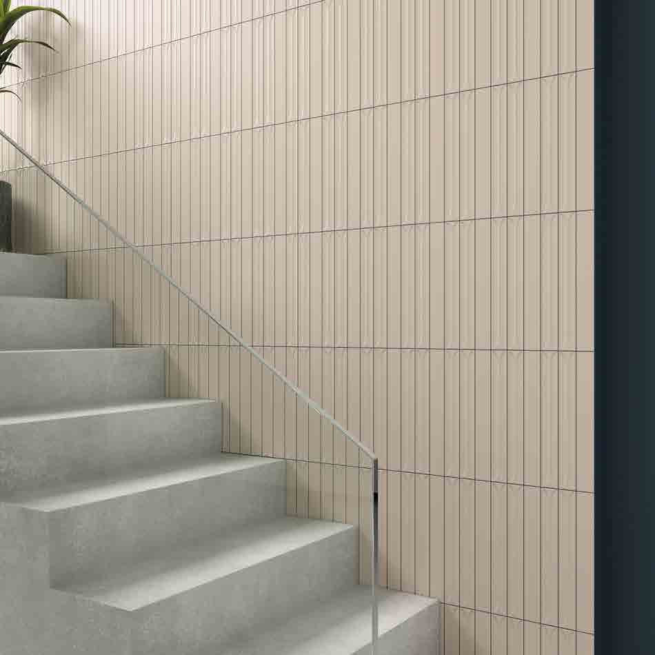 Mingle Sand Ceramic Wall Tile on a stairwell wall